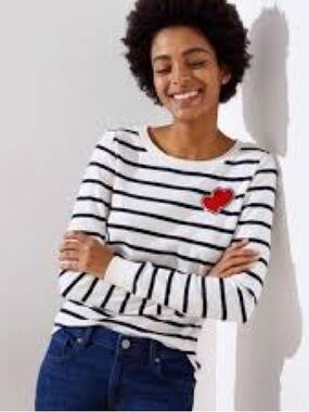 LOFT striped long-sleeve sweater featuring a heart patch appliqué on the chest.